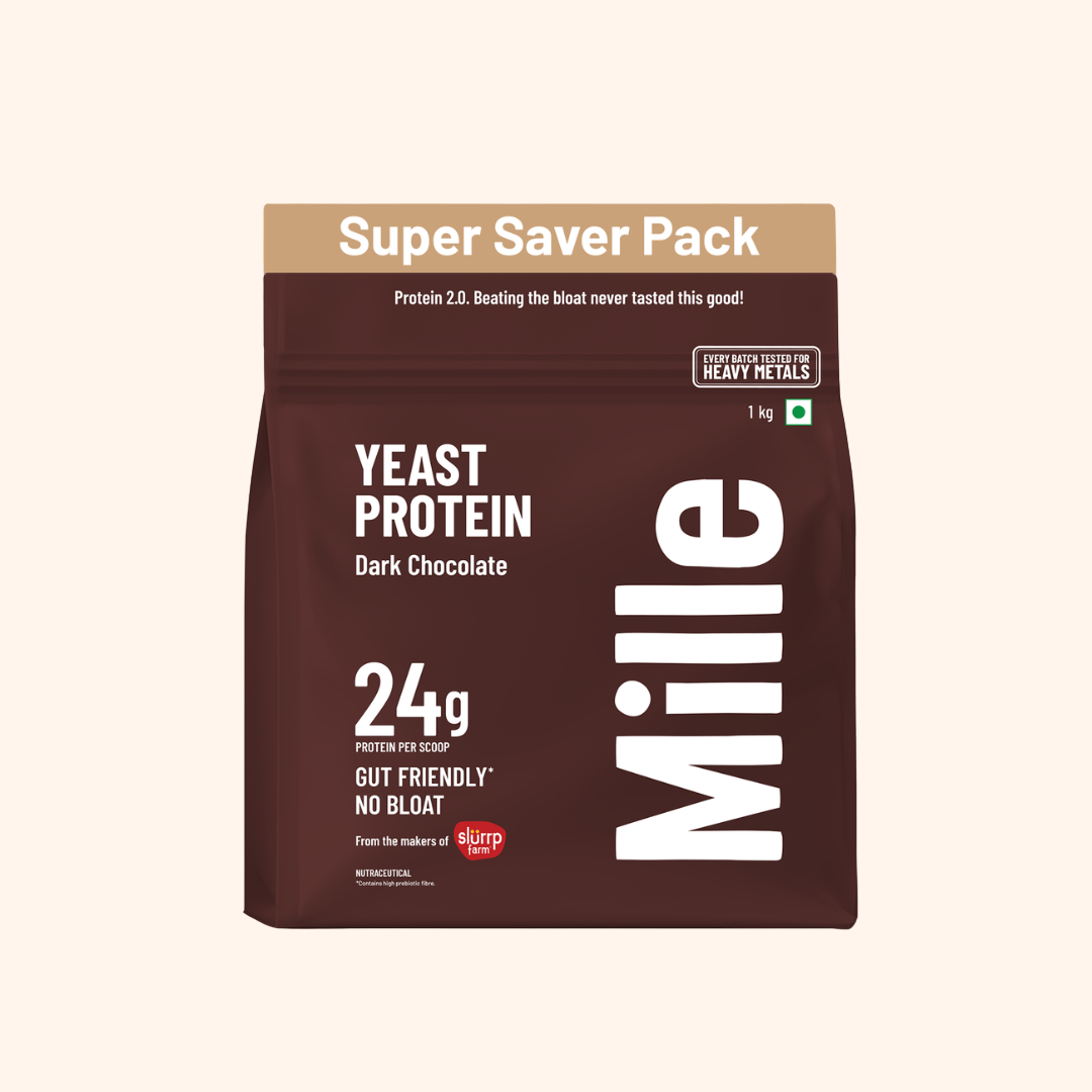 A 1 kg bag of Mille Yeast Protein Dark Chocolate powder, part of their Super Saver Pack, shown on a solid light beige background.