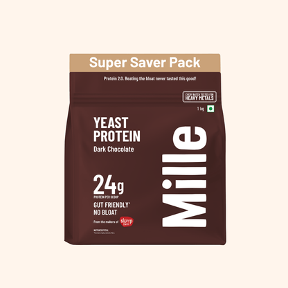 A 1 kg bag of Mille Yeast Protein Dark Chocolate powder, part of their Super Saver Pack, shown on a solid light beige background.