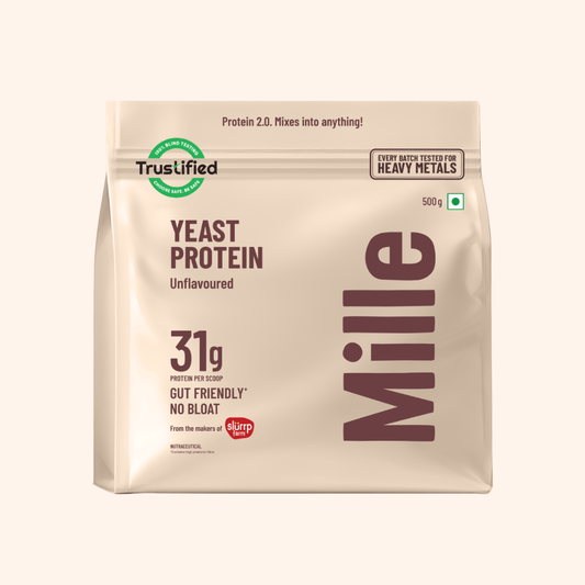 A 500g bag of Mille Yeast Protein Unflavoured protein powder, featuring a beige packaging design with dark brown text and a green Trustified logo, set against a solid cream background.